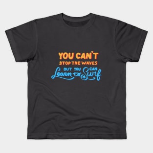 You can't stop the waves but you can learn to surf Kids T-Shirt